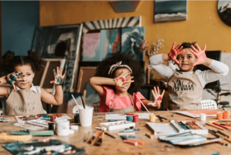 Children engaged in creative summer activities