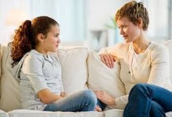 Parent helping child understand emotions